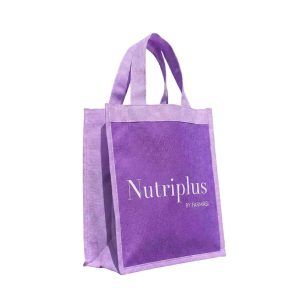 Bolsa ecologica POP morada combinada con tela sublimable logo Nutriplus modelo convencional con fuelle.